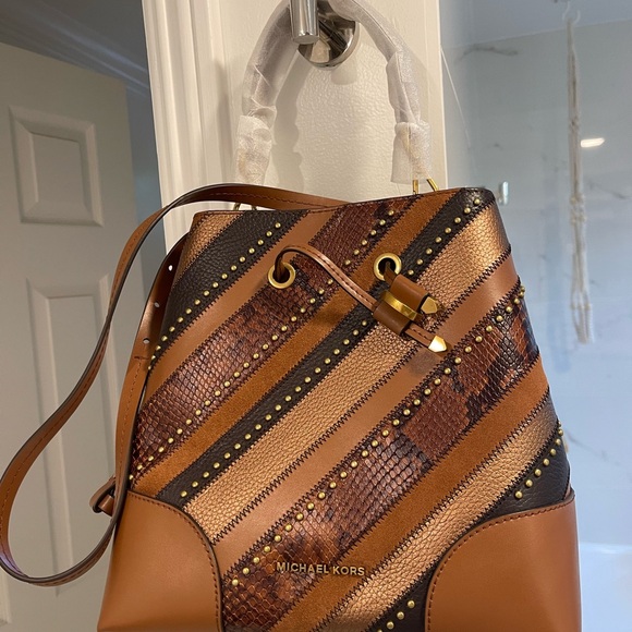 Michael Kors Handbags - Michael Kors Brown and Tan Striped Leather Drawstring Bucket Bag